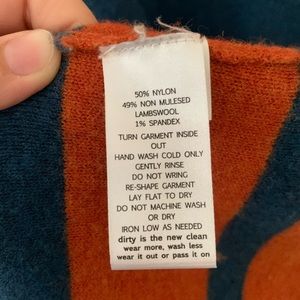 Orange and Blue Toad & Co. sweater with bell sleeves